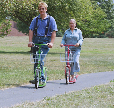 Amy ansd Karl on Amish Scooters